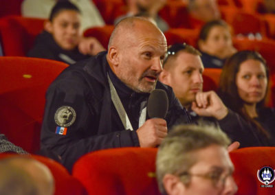 Intervention d'un visiteur appartenant à la Gendarmerie Nationale et assistant à une conférence sur Cyno-Ops